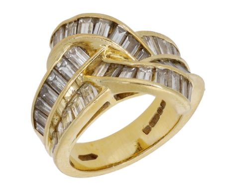 An 18ct gold and diamond dress ring, of stylised knot design, channel-set to the front with baguette-cut diamonds, London hal