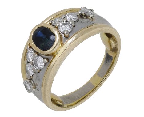 A sapphire and diamond ring, French, the bicoloured band of tapered design, set to the front with an oval-cut sapphire and br