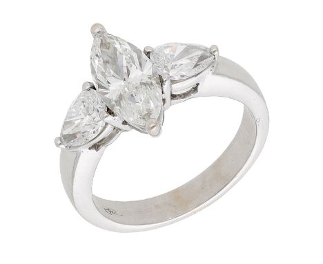 A diamond three stone ring, set with a marquise-cut diamond with a pear-cut diamond to either side, stamped ‘750’, principal 