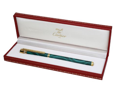 A Vendome green ‘malachite’ lacquer ballpoint pen by Must de Cartier, the pen signed, serial number ‘B26177’, maker’s case, l