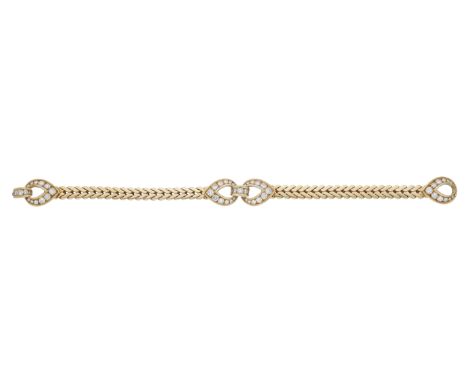 A diamond bracelet by Cartier, circa 1960, the fancy-link chain with interlocking pear-shaped motifs set with graduated brill