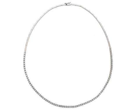 A diamond line necklace, set with a continuous row of brilliant-cut diamonds, to a polished brick-link back chain, stamped ‘7