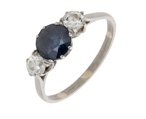 A sapphire and diamond three stone ring, the round-cut sapphire between two brilliant-cut diamonds, total diamond weight appr