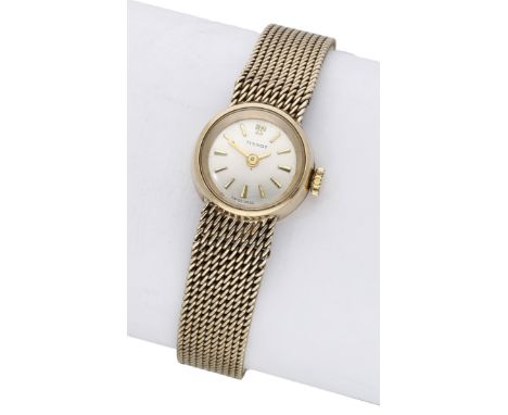 Tissot. A lady’s gold bracelet watch, circa 1961. Movement: cal. 709, manual winding, 17 jewels. Dial: silvered, applied bato