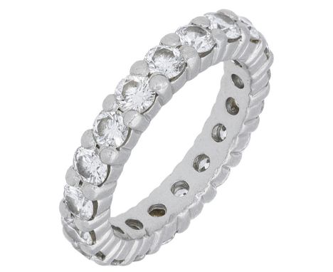 A diamond eternity ring, set throughout with brilliant-cut diamonds, mounted in platinum, stamped ‘PT950’, total diamond weig