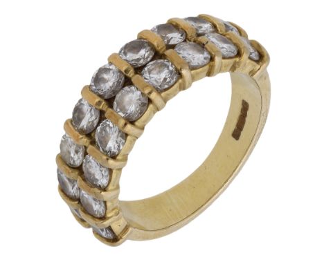 An 18ct gold two row diamond ring, the tapered band tension-set to the front with a double row of brilliant-cut diamonds, Lon