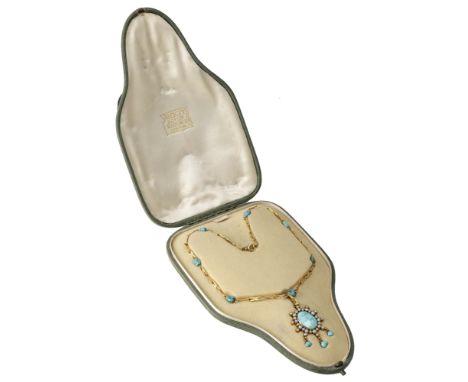 A turquoise and seed pearl necklace retailed by Liberty & Co., the hammered fancy-link gold chain spaced by turquoise beads a
