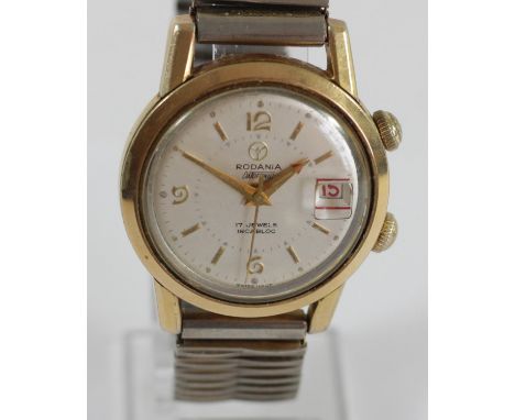 Rodania Defonic, a gilt metal manual wind alarm and date gentleman's wristwatch, red arrow for alarm and pull button to set, 
