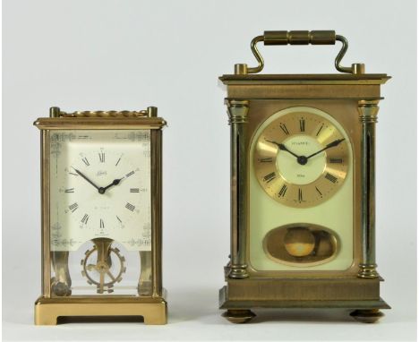 A mid 20th Century 8 day carriage clock striking to bell, retailed by H Samuel - 18cm tall, together with a German made 8 day