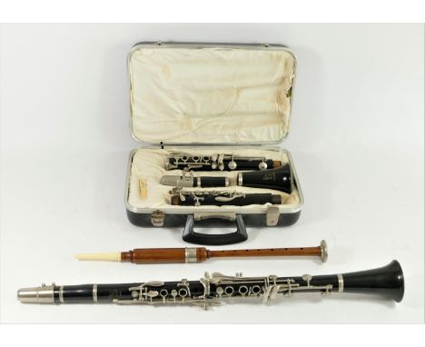 A Boosey &amp; Hawkes. London, clarinet (model 456542), fitted fabric lined hard case, together with a similar Boosey &amp; H