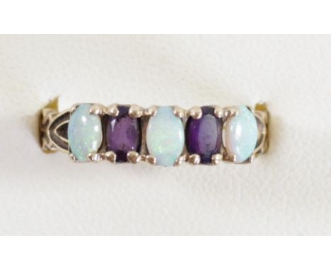 A 9ct gold opal and amethyst ring, O, 2.5gm 