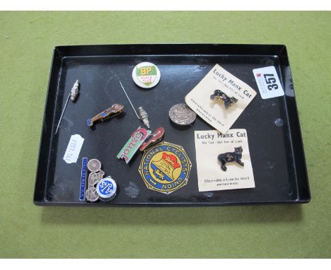 Isle of Man T.T Enamelled and Silvered Badge as a Motorcyclist, made in Birmingham, 3.2cm wide. Two bathing beauty badges by 