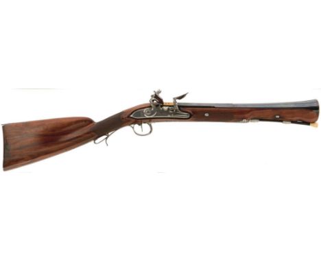 A FINE AND VERY RARE FLINTLOCK BLUNDERBUSS BY BOUTET, 15.75inch three-stage blued barrel decorated with an urn and scallops a