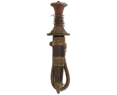 A 19TH CENTURY NORTH AFRICAN ARM DAGGER, 15cm flattened diamond section blade, rusted, characteristic turned wooden hilt with