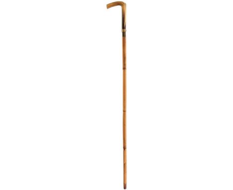 A 19TH CENTURY CONTINENTAL SWORD STICK OF SMALL PROPORTIONS, 31cm flattened diamond section blade decorated with scrolling fo