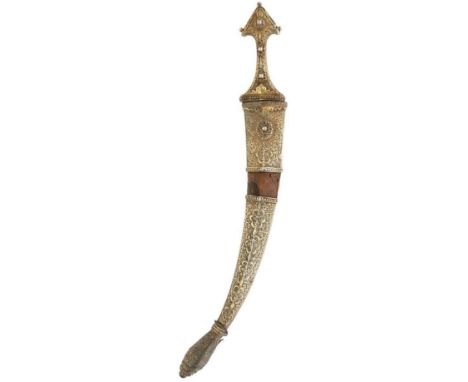 A COLLECTION OF 19TH CENTURY JAMBIYA, the first Wahabite and with 31cm curved blade decorated with a geometric panel, charact