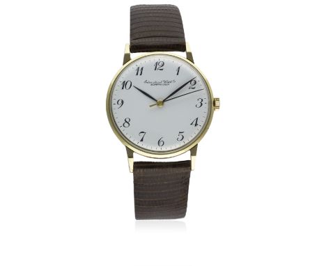 A GENTLEMAN'S 9CT SOLID GOLD IWC SCHAFFHAUSEN WRIST WATCH CIRCA 1970D: White dial with black Arabic numerals &amp; hands. M: 