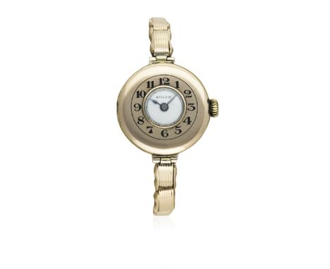 A LADIES 9CT SOLID GOLD ROLEX HALF HUNTER BRACELET WATCH CIRCA 1920s
 D: White enamel dial. M: 15 jewel manual wind movement 