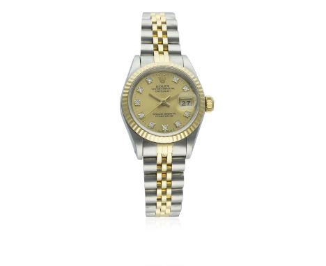 A LADIES STEEL &amp; GOLD ROLEX OYSTER PERPETUAL DATEJUST BRACELET WATCH CIRCA 1987, REF. 69173D: Champagne dial with diamond
