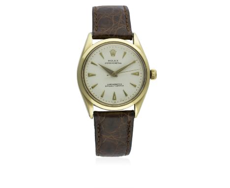 A GENTLEMAN'S 18K SOLID GOLD ROLEX OYSTER PERPETUAL WRIST WATCH CIRCA 1950s, REF. 6284 D: Silver "honeycomb" dial with gilt "