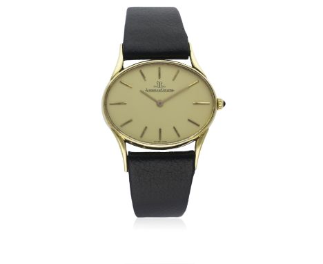 A GENTLEMAN'S 18K SOLID GOLD JAEGER LECOULTRE WRIST WATCH CIRCA 1970sD: Champagne dial with gilt batons &amp; hands. M: Manua