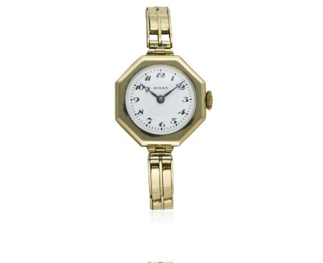 A LADIES 18K SOLID GOLD ROLEX BRACELET WATCH CIRCA 1920s 
D: White enamel dial with Arabic numerals. M: Manual wind Rolex mov