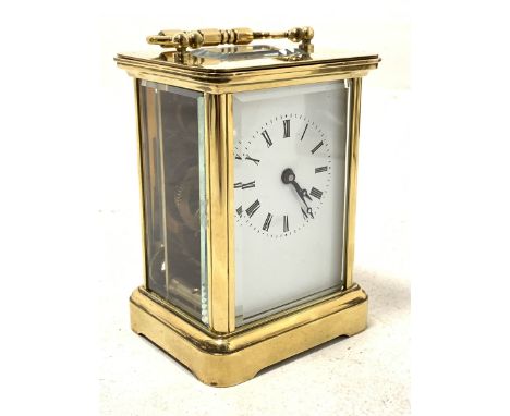 Brass four glass carriage time piece clock, white enamel dial with Roman numeral chapter ring, W8cm