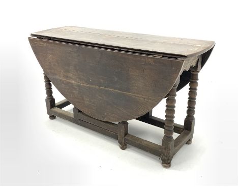  18th Century oak gateleg dining table, oval top raised on bobbin turned supports, W140cm  