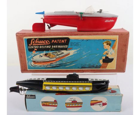 Schuco Tinplate/Plastic 5411 Elektro Delfino Navico Speed Boat, red/silver plastic body, lithographed tinplate interior, miss