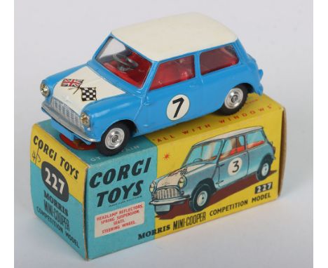 Corgi Toys 227 Morris Mini Cooper competition model, blue body, white roof/ bonnet, crossed flag decals, red interior, shaped