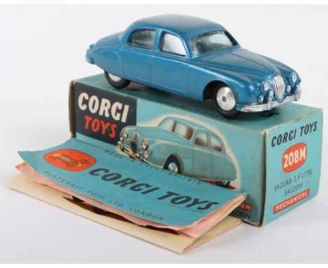 Scarce Corgi Toys 208M Mechanical Jaguar 2.4 Litre Saloon, metallic blue body, flat spun wheels, in near mint original condit