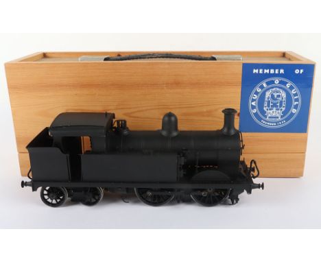 0 gauge brass and metal kit built 0-4-4 tank engine, two-rail electric locomotive finished in black, details including brakes