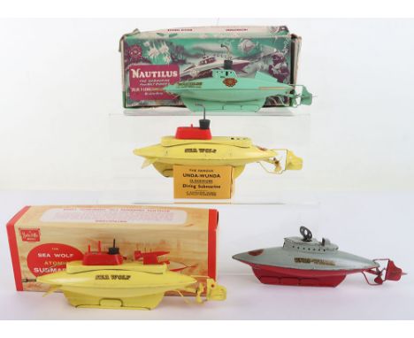 Four Sutcliffe Tinplate Submarines, The famous Unda Wunda, grey/red body, with shop display card, with key, missing periscope