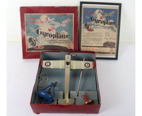 Boxed Wells O London tinplate flying Gyroplane, 1930s, silver monoplane with RAF roundels and pilot, AD GE markings, 28cm (11