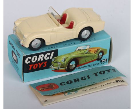 Corgi Toys 301 Triumph TR2 Sports Car, cream body, red seats, flat spun wheels, in mint bright original condition, with an ea
