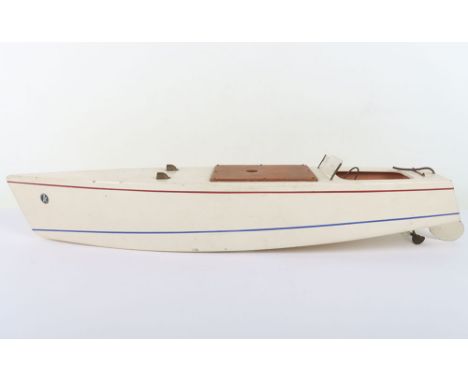 Kellner for Lines Bros Tri-ang ‘K’ wooden clockwork Speed boat, 1937-38, cream painted wooden hull with blue and red lining, 