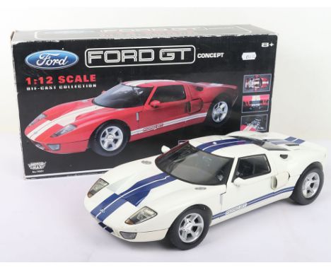 A Motormax  1/12 scale Ford GT Concept car,diecast model ,finished in white/ blue stripes in near mint condition, box has edg