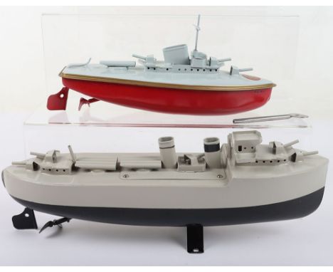 Sutcliffe tinplate clockwork model Torpedo boat Fury, 1950s, red and grey with three guns, torpedo tubes and mast, 23.5cm (9 