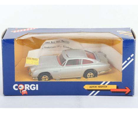 Corgi  C271/1 James Bond Aston Martin DB5, silver body, red interior, with bandit figure,  small spoke wheels version, circa 