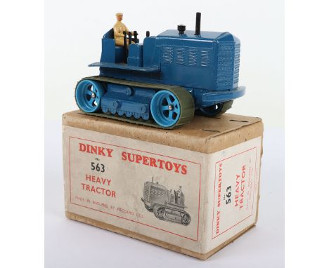 Scarce Dinky Supertoys 563 Heavy Tractor, dark blue body, mid blue rollers, green rubber tracks, beige driver, in near mint b