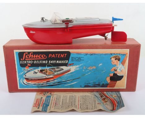 Schuco Tinplate/Plastic 5411 Elektro Delfino Navico Speed Boat, red/silver plastic body, lithographed tinplate interior, comp