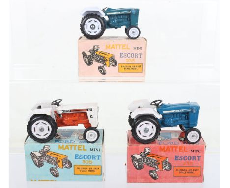 Three Maxwell Toys India Mattel Tractors, 1001 Ford 3600  blue/ white body, 1002 Escort 335 white/orange body and 1003 Ford 3