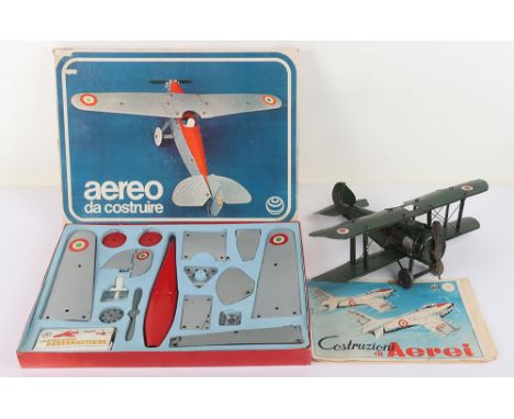 Tinplate model Sopwith Camel fighter bi-plane,  finished in green with RAF roundels, pilot and machine guns, 33cm (13”) wings