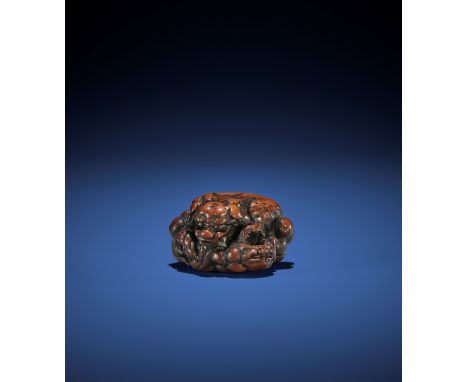 A SUPERB AND LARGE NAGOYA SCHOOL WOOD NETSUKE OF TWO FIGHTING SHISHI, ATTRIBUTED TO TAMETAKA Attributed to Tametaka, unsigned