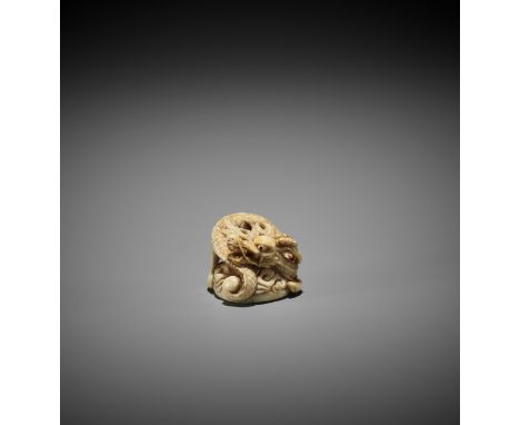 A POWERFUL IVORY NETSUKE OF A DRAGON, ATTRIBUTED TO MITSUHARU Attributed to Mitsuharu, unsignedJapan, Kyoto, late 18th centur