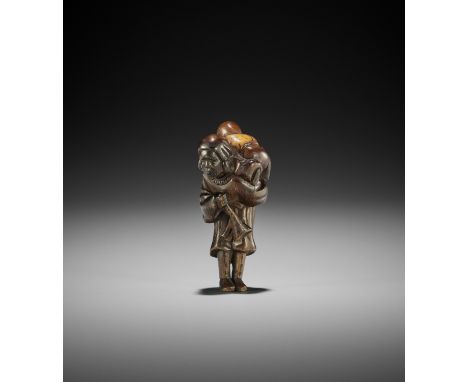 A VERY RARE SAIKAKU (RHINOCEROS HORN) NETSUKE OF A DUTCHMAN AND CHILD UnsignedJapan, late 18th century, Edo period (1615-1868