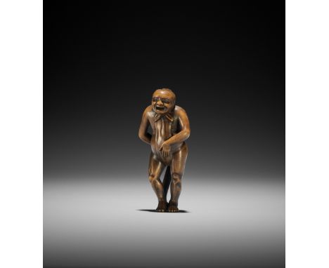 A WOOD NETSUKE OF A NAKED MAN TYING HIS FUNDOSHI UnsignedJapan, early 19th century, Edo period (1615-1868)The naked man visib