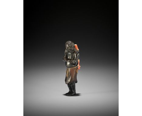 SHIBAYAMA SOICHI: A FINE INLAID EBONY WOOD NETSUKE OF A CORAL FISHERMAN By Shibayama Soichi, signed Soichi 宗一Japan, Edo/Tokyo