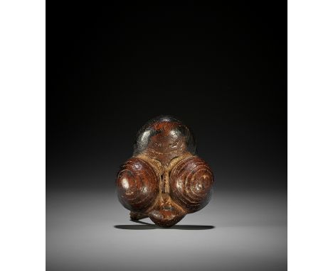 A LARGE AND UNUSUAL WOOD SHUNGA MASK NETSUKE OF OKAME Unsigned Japan, 19th centuryThe unusual, rather rustic netsuke carved f