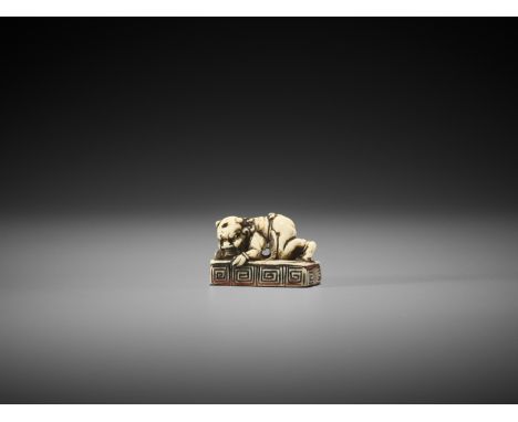 A RARE IVORY SEAL NETSUKE WITH AN ONI UnsignedJapan, late 18th century, Edo period (1615-1868)The rectangular seal with a cut